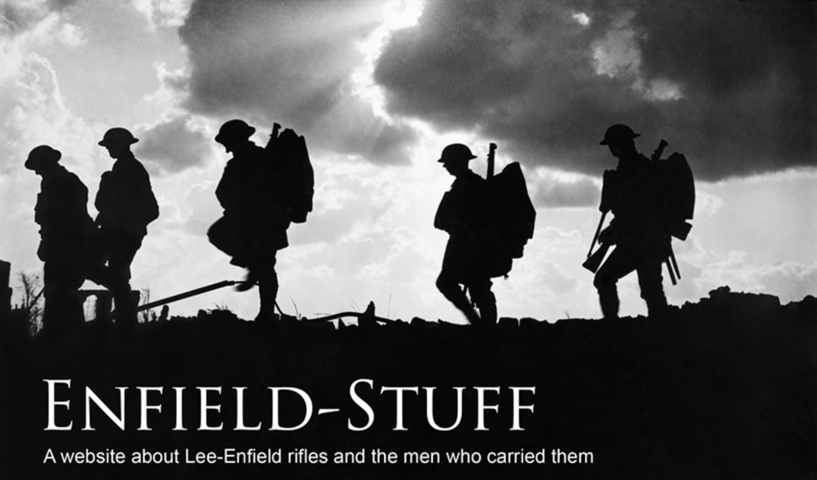 A line of British soldiers from the 8th Battalion, East Yorkshire Regiment, weighted down with their packs and rifles, are silhouetted against the evening sky as they move up to the front lines near Frezenberg, Belgium, October 1917.  Imperial War Museum photograph Q-2978.  Photographer Ernest Brooks.  Photo caption “Enfield-Stuff: A website about Lee-Enfield rifles and the men who carried them.”